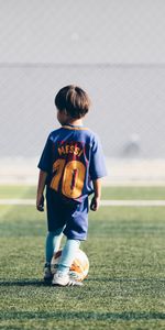 Ball,Football,Lawn,Footballer,Child,Football Field,Sports