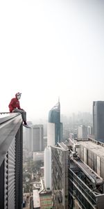 Building,Miscellanea,Miscellaneous,Overview,Height,Human,Person,Roof,City,Review