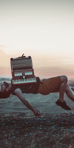 Flight,Accordion,Musician,Levitation,Musical Instrument,Music