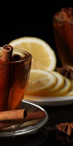 Food,Cinnamon,Lemon,Cup,Tea,Black Background