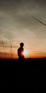 Grass,Sky,Shine,Person,Sunset,Light,Silhouette,Human,Dark