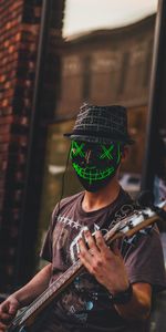 Guitar,Miscellanea,Miscellaneous,Human,Person,Musician,Guitar Player,Guitarist,Mask