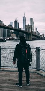 Miscellanea,Bridge,Cap,Human,Person,Backpack,Rucksack,Miscellaneous