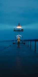 Miscellanea,Dusk,Lighthouse,Person,Pier,Human,Twilight,Umbrella,Sea,Miscellaneous