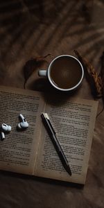 Miscellanea,Miscellaneous,Cup,Book,Coffee,Text,Headphones