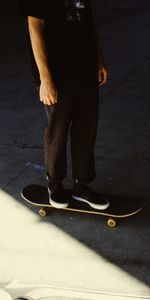 Miscellanea,Miscellaneous,Legs,Asphalt,Shadow,Human,Person,Skateboard