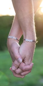 Pair,Touch,Touching,Bracelets,Miscellanea,Miscellaneous,Fingers,Couple,Hands