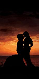 Rock,Silhouette,Pair,Sunset,Stone,Embrace,Love,Couple