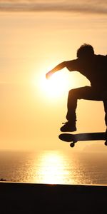 Skateboard,Sunset,Trick,Skate,Skater,Silhouette,Sports