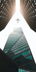 Sky,Building,Miscellanea,Miscellaneous,Skyscrapers,Airplane,Plane