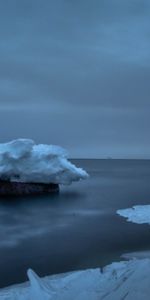 Sky,Rock,Overcast,Nature,Mainly Cloudy,Ice,Snow,Stone,Sea