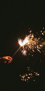 Sparks,Sparklers,Hand,Bengal Lights,Dark