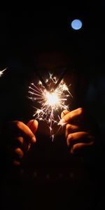 Sparks,Sparklers,Hands,Bengal Lights,Glow,Dark