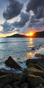 Sunset,Stones,Coast,Beams,Rays,Nature,Sea