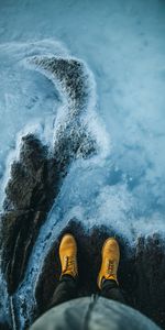 Water,Rock,Shore,Bank,Miscellanea,Legs,Boots,Shoes,Miscellaneous,Stone